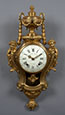 Rare Finely Chased Gilt Bronze Neoclassical Cartel 
aux espagnolettes 
Frédéric Duval, horloger agrégé à la corporation en 1777 
Case Attributed to Robert Osmond (1711-1789), 
Paris, early Louis XVI period, circa 1775-1780